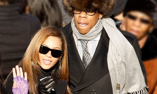 Beyonce and Jay-Z in crowd wearing winter coats