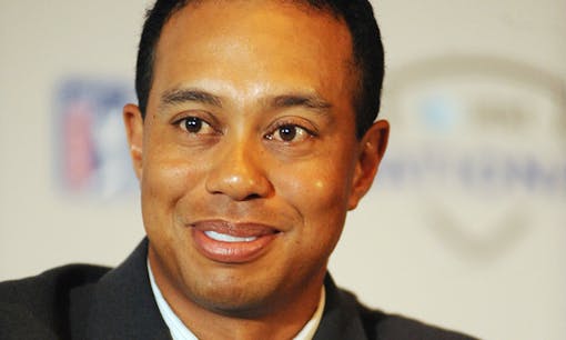 Tiger Woods smiling at press conference