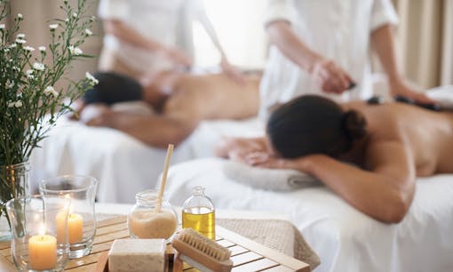 Couple receiving massages