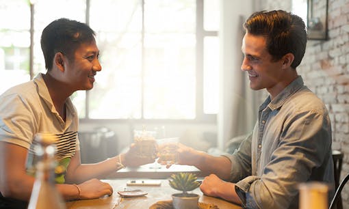 A couple talking in a coffee shop