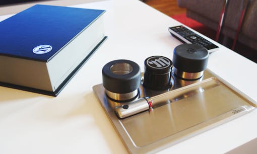 Myster cannabis storage products displayed on coffee table