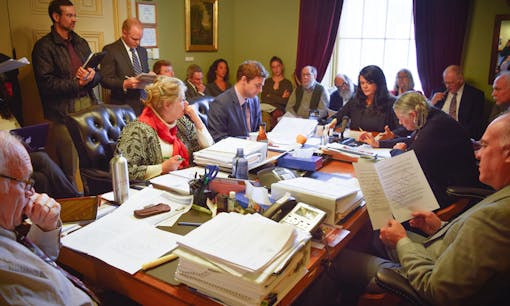 Members of Vermont's House Judiciary Committee reviewing the cannabis legalization measure