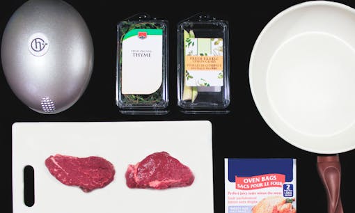 Ingredients for infused beef tar tar: raw beef, herbalizer, thyme, lemon grass, turkey bag, and pan