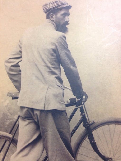 Antonio Pezzoli with a bicycle