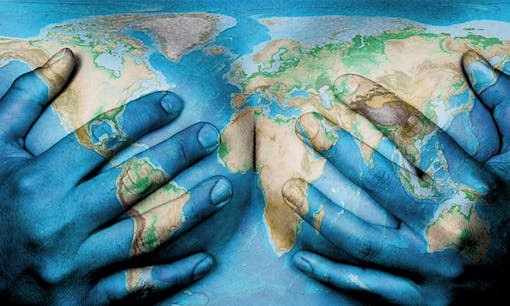 World map projected onto hands covering breasts