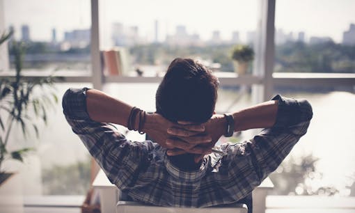 Man relaxing on chair