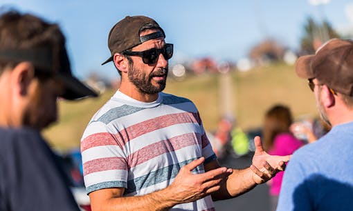Former NFL player Nate Jackson talking at a Denver Broncos tailgate with Leafly