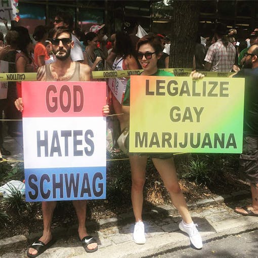 N.A. Poe, left, and fellow activist Rachel Friedmann troll the Westboro Baptist Church outside the Democratic National Convention in Philadelphia. Photo by Jay Lassiter