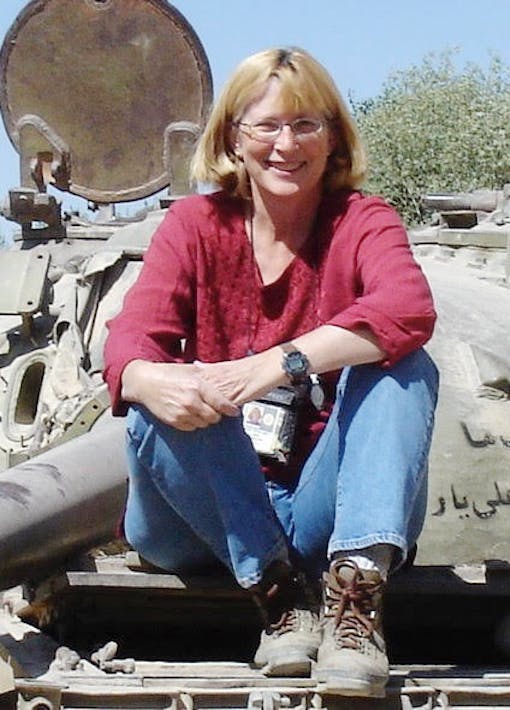 Former Cook County, Illinois prosecutor Inge Fryklund seated on a tank