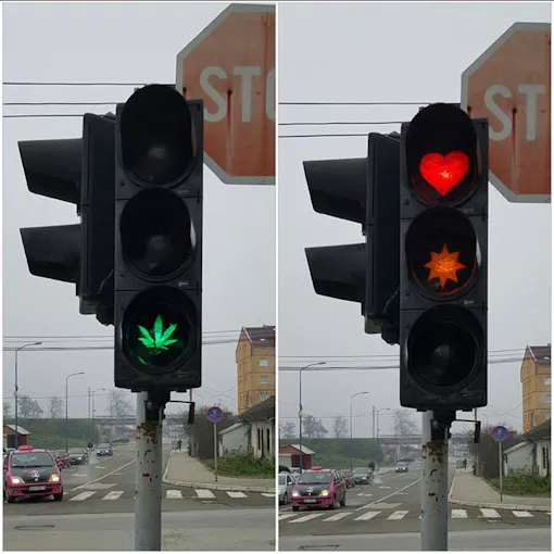 Altered traffic lights in Serbia featuring a cannabis leaf as the green light symbol