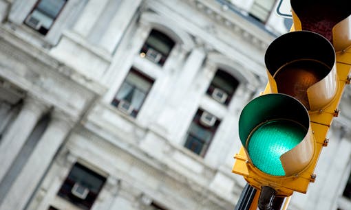 Green traffic light in city