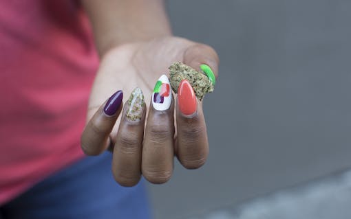 The end result: a glossy, organic-looking fingernail accent amid Leafly colors and our tile logo.