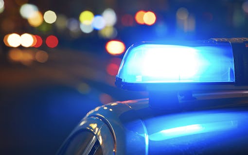 Police car on street at night