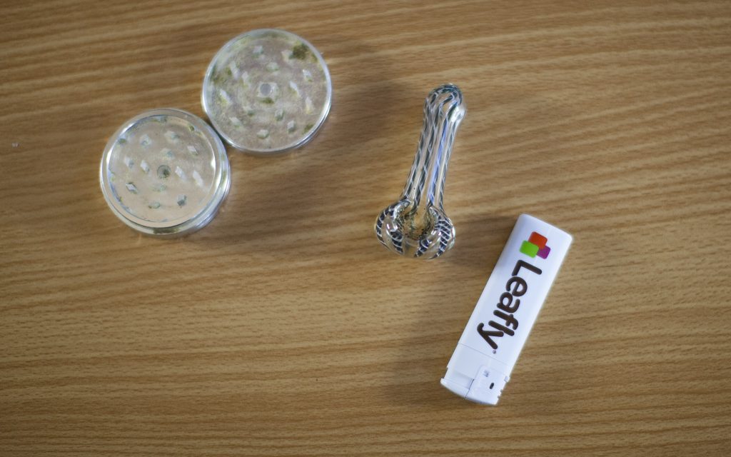 Grinder, weed pipe (bowl) and Leafly lighter