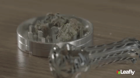 Gif demonstrating how to pack a bowl of weed