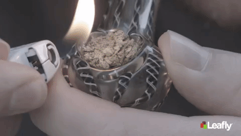 Gif demonstrating how to light and smoke a bowl of weed