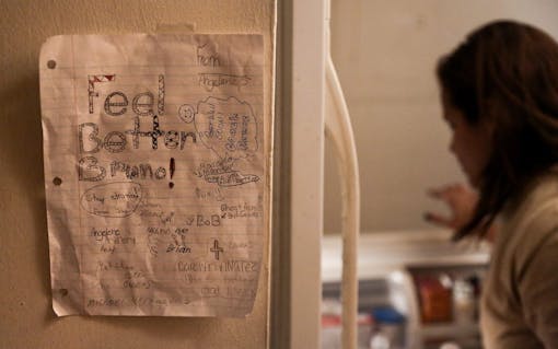 Words of support from Bruno Stillo's sister Angelene. Delgadillo says that having five people living in one small apartment is tough, but she relies on everyone to do their part in taking care of Bruno. (Scott McIntyre for Leafly)