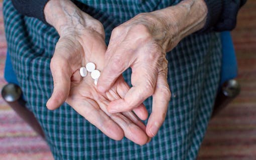 Grandma taking pills