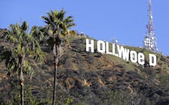 The Hollywood sign is seen vandalized Sunday, Jan. 1, 2017. Los Angeles residents awoke New Year's Day to find a prankster had altered the famed Hollywood sign to read "HOLLYWeeD." Police have also notified the city's Department of General Services, whose officers patrol Griffith Park and the area of the rugged Hollywood Hills near the sign. California voters in November approved Proposition 64, which legalized the recreational use of marijuana, beginning in 2018. (AP Photo/Damian Dovarganes)