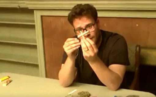 Seth Rogen showing off his cross joint