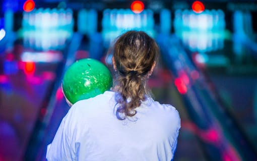 Robert Calkin lines up for a throw during The Big Lebongski Bowling Tournament. (Justin Stewart for Leafly)