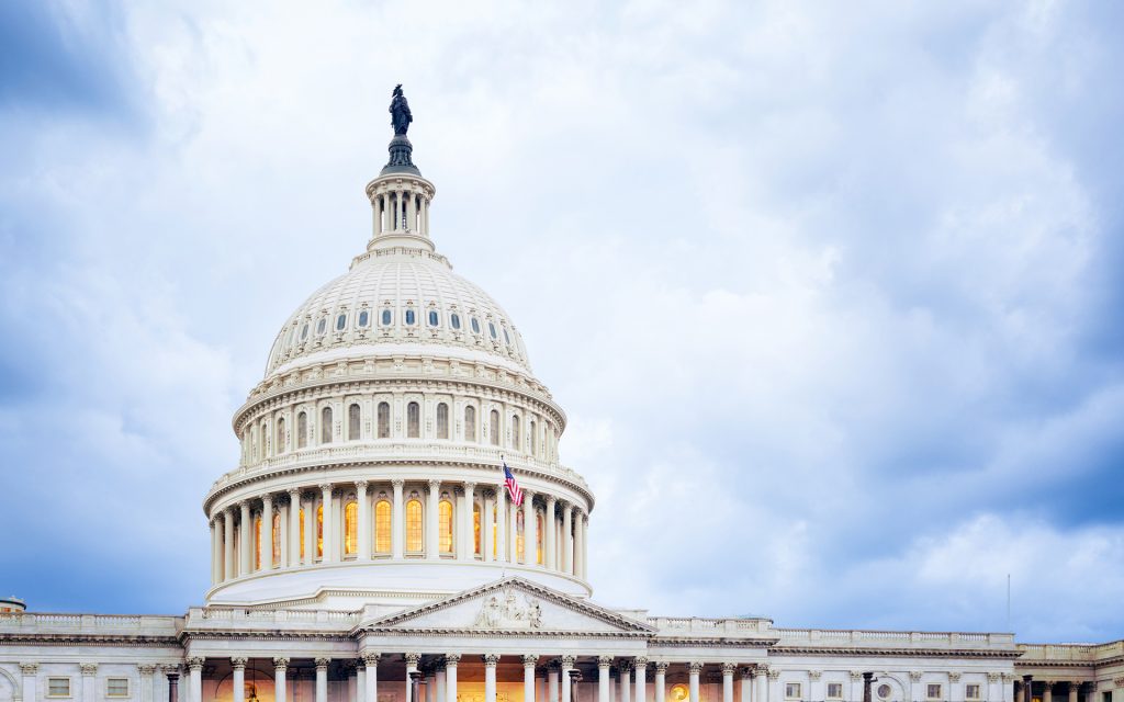 the dome of the US Capitol seen on a cloudy day