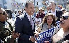 FILE - In this May 11, 2018 file photo Antonio Villaraigosa, the former mayor of Los Angeles, chats with constituents during a campaign stop in San Francisco. The heat for California governor is especially intense for Republican Cox and Democrat Antonio Villaraigosa, whom polls show to be in a tough fight for the second of two slots on the general election ballot. Democrat Gavin Newsom is the undisputed front-runner and is expected to advance. The primary is Tuesday, June 5, 2018, and more than 1.4 million ballots have already been cast by mail. (AP Photo/Marcio Jose Sanchez,File)