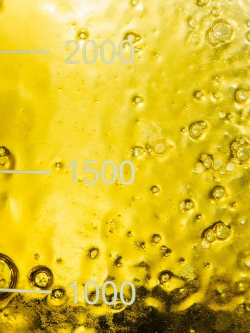 Heylo's cannabis extraction process: a glass of CO2 cannabis oil