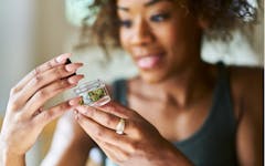 women looks at cannabis