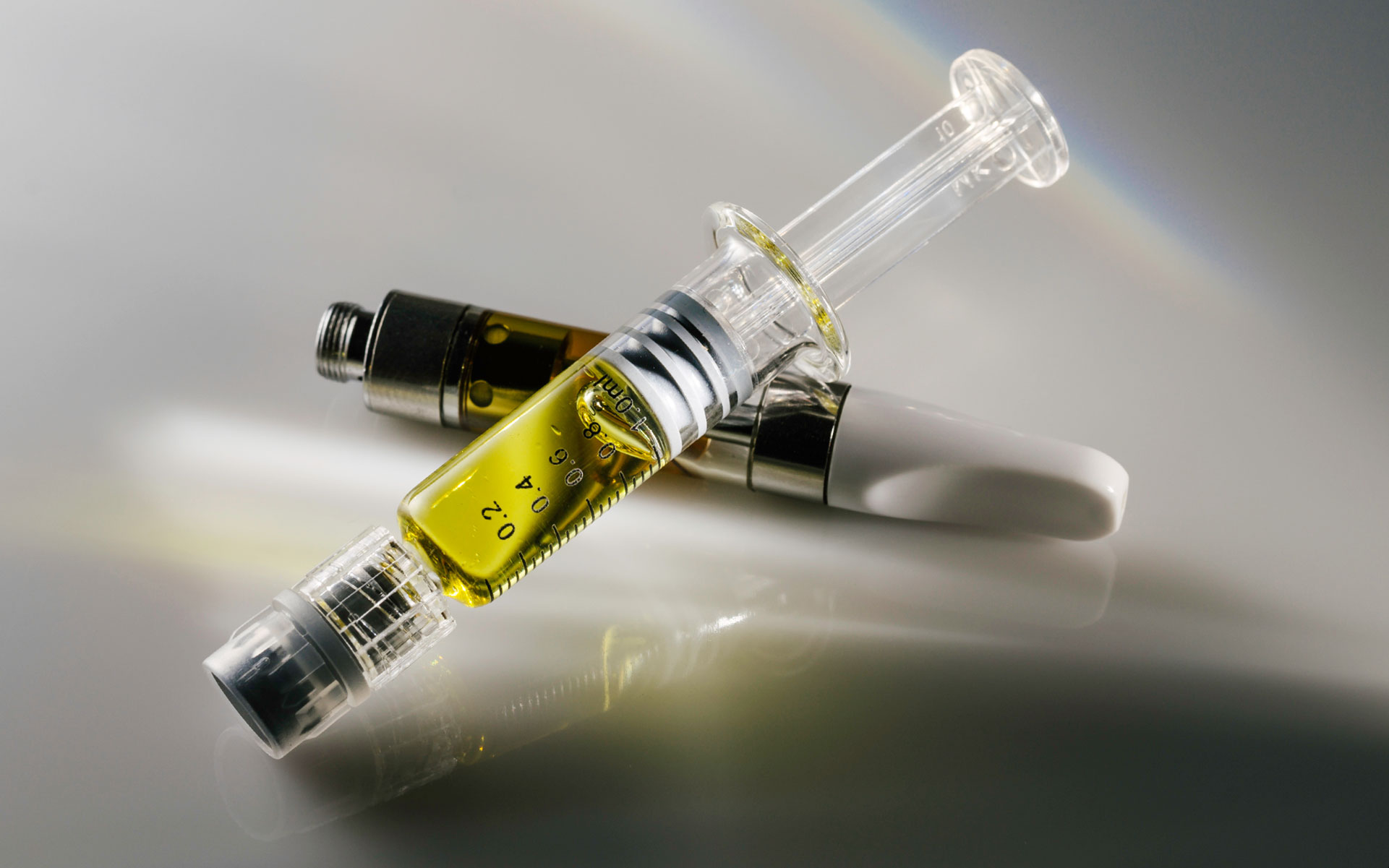 Marijuana Oil Dropper And Vape Pen On White Backgorund Stock Photo -  Download Image Now - iStock