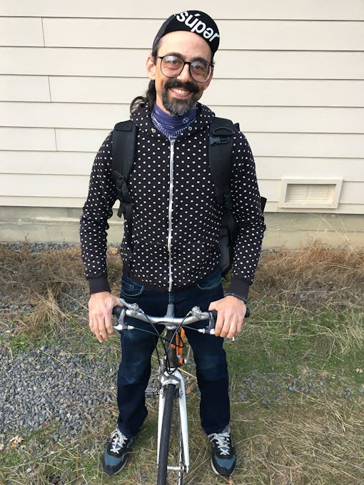 'Sweetleaf' Joe Airone of Trinity, CA. poses on the bike he uses give away free medical cannabis to the sick and dying of San Francisco. A new bill makes donations tax-exempt. (Courtesy Sweetleaf Joe)