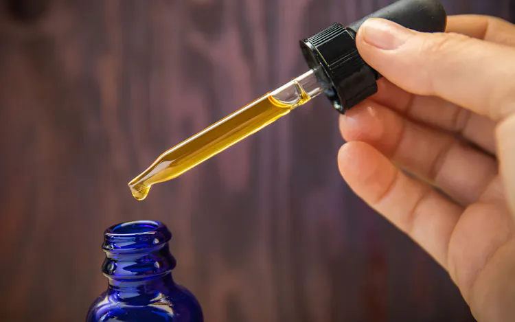 Cannabis tinctures 101: How to make, consume, and dose them image