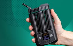 vapes hand holding vape; vaporizers vaping cannabis