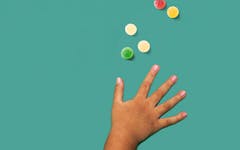 child's hand reaching for candy ;what happens when kids eat marijuana edibles