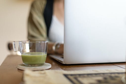 Relaxed woman working from home on her laptop