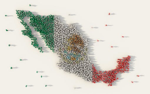 Large group of people forming Mexico map and national flag