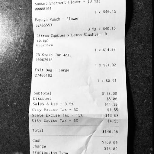 This receipt from TLC in Los Angeles illustrates how sales tax plus state and city excises make $118 in weed $146. (David Downs/Leafly)