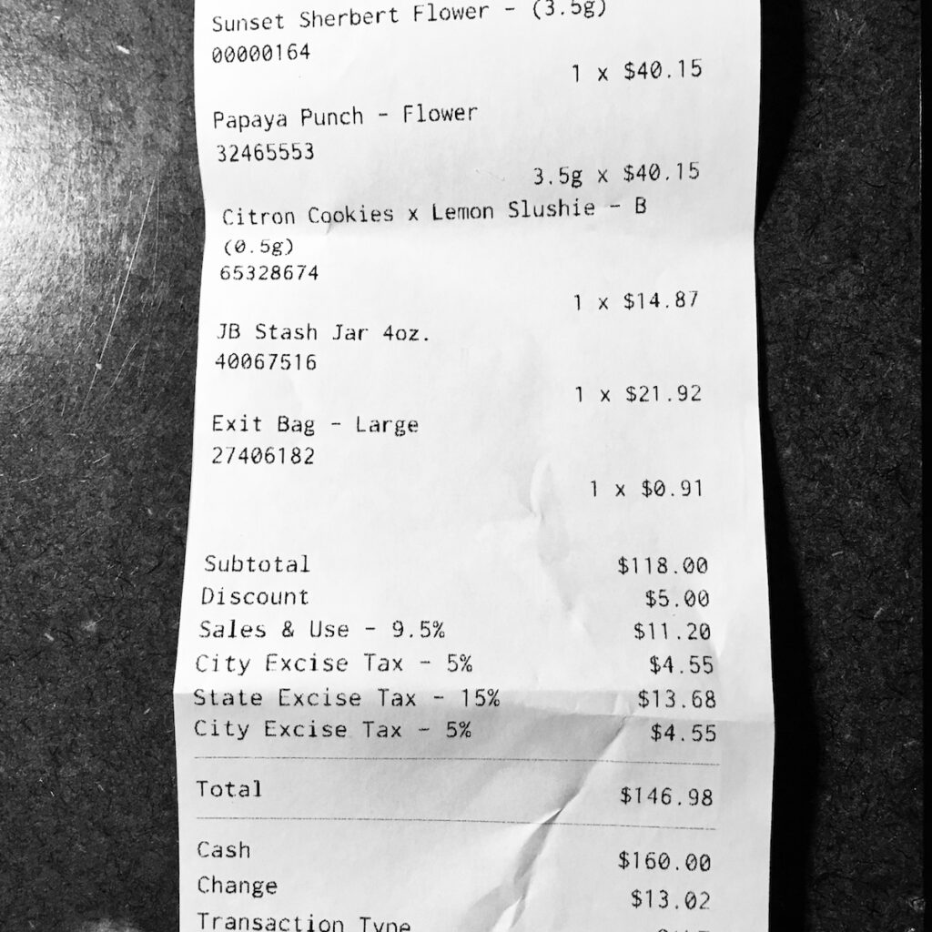 This receipt from TLC in Los Angeles illustrates how sales tax plus state and city excises make $118 in weed $146. (David Downs/Leafly)