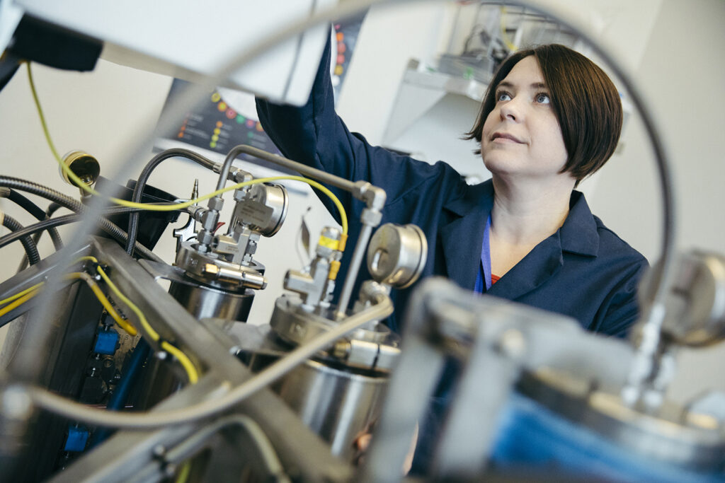 Katie Stem of Peak Extracts in the lab