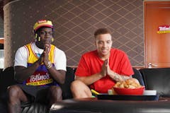 image-of-two-men-snacking-on-pizza-rolls