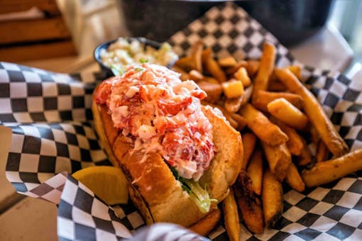 photo-of-a-lobster-roll-and-fries