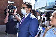 photo-of-former-mayor-at-his-sentencing-hearing-outside-the-courthouse