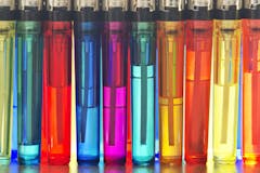 Multi-colored cigarette lighters close up.