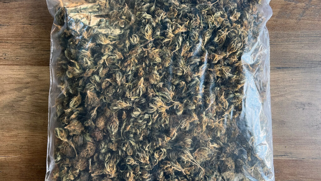 A bag of decarbonized nuggets on a wooden background