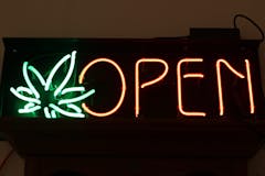 A cannabis gifting shop in New York City attracts visitors with a neon sign. (Leafly / Megan Schmidt)