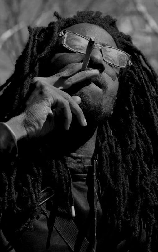 A man smokes a joint in New York's Washington Square Park.