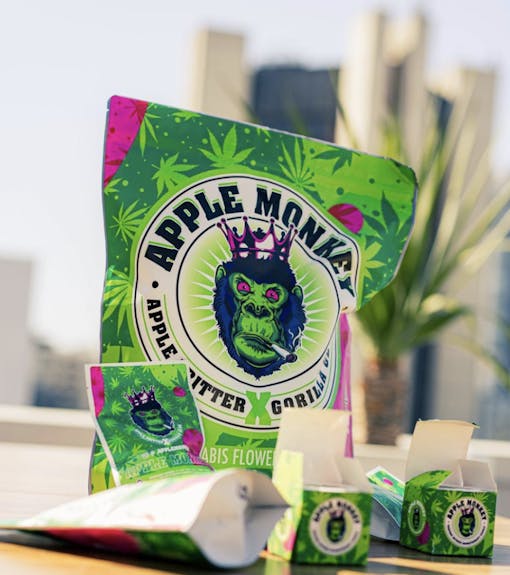 Apple Monkey packaging overlooking city skyline (Instagram / @_AppleMonkey)