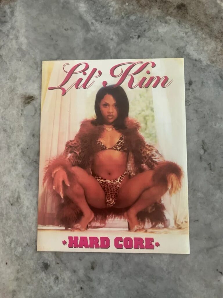 Lil' Kim sparked the libido of a generation with the 1996 promotional poster for her debut album Hardcore. Now she is launching a line of legal cannabis products that are said to have the same arousing effect on adults in legal states. (via Grailed / Original Album Photography by Michael Lavine)