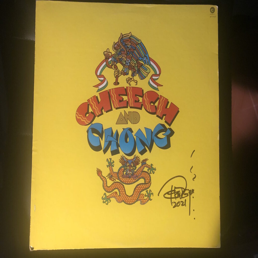 A Cheech and Chong yellow dragon and eagle record sleeve signed by Tommy