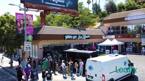 Shoppers wait outside to enter the Joke's Up Ice Kream Dispensary grand opening in Santa Monica, CA. (Amennu McGruder / Leafly)